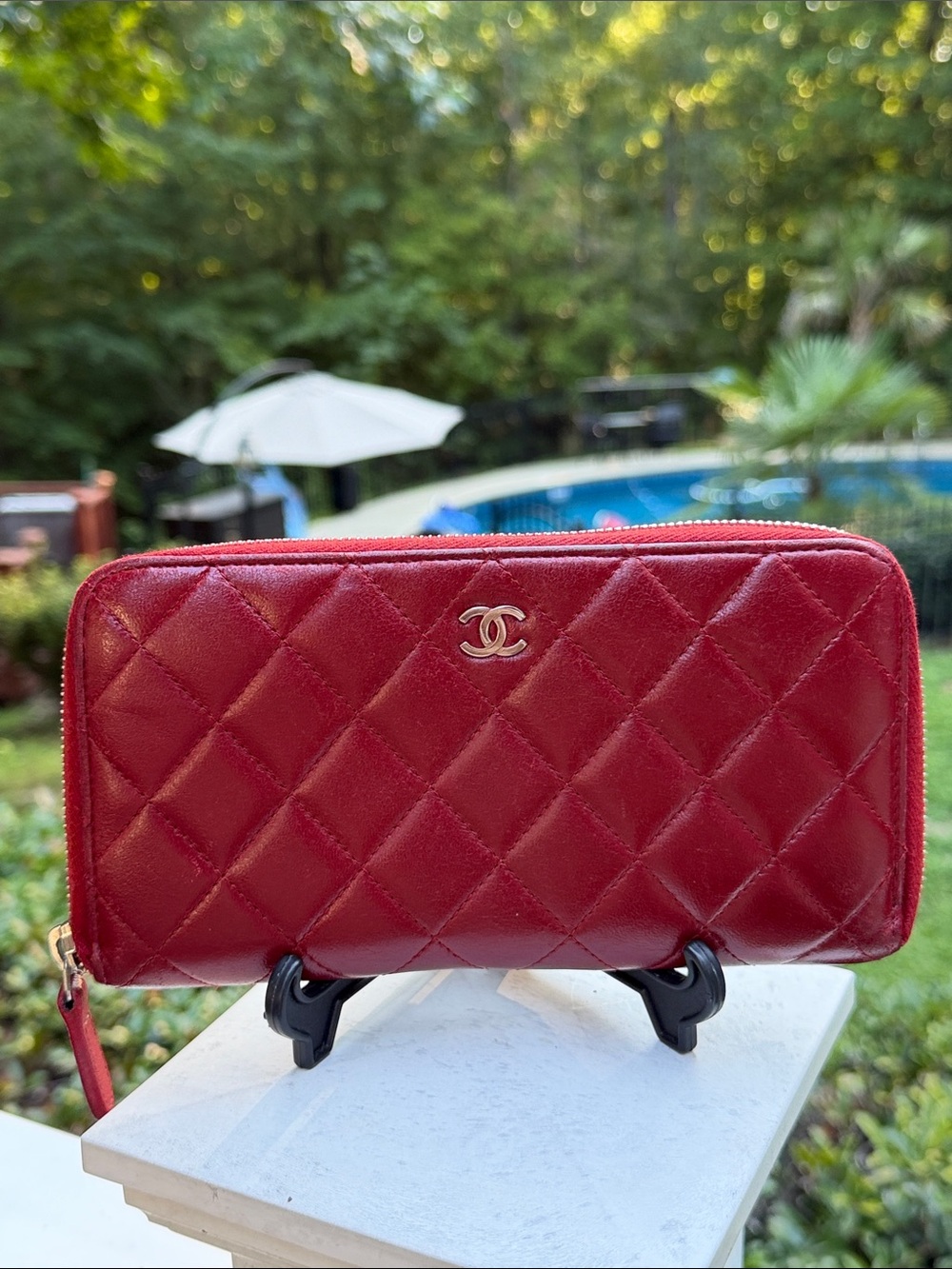 CHANEL Authenticated Quilted Caviar Leather Zip-Around Wallet in Burgundy/red